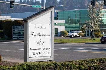 photo of firm's office sign outside